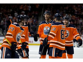 The Edmonton Oilers celebrate Darnell Nurse's (25) third period goal against the Montreal Canadiens, in Edmonton Tuesday Nov. 13, 2018. The Oilers won 6-2.