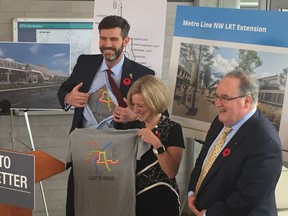 Edmonton Mayor Don Iveson, Premier Rachel Notley and Transportation Minister Brian Mason as the province announced $1 billion in LRT funding.