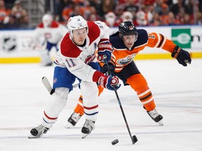 Oilers' Mike Cammalleri pursues Canadiens' Brendan Gallagher at Rogers Place on Saturday, Dec. 23, 2017, in Edmonton.