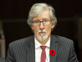 Privacy Commissioner Daniel Therrien waits to appear at the House of Commons information, privacy and ethics committee in Ottawa, Thursday November 1, 2018.