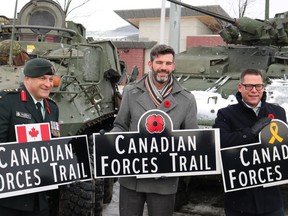 Ward 3 City Councillor Jon Dziadyk unveiled the renamed Canadian Forces Trail (97 Street) decorative street signs on Nov. 5, 2018. Councillor Dziadyk  joined Edmonton Mayor Iveson and Colonel Mackenzie for the unveiling. Members of the public have been invited to the event that marks the beginning of Veterans' Week. Troops and military equipment will be present. Photo by Kyle Murphy