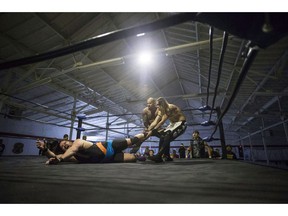 Tag team wrestling at the SynRGY Pro Wrestling event at the Oshawa Curling Club on Sunday June 4 , 2017. An Edmonton city hall committee has decided that professional wrestling is simply entertainment and is recommending council strike it from the card of similar events it does have to govern.The Community and Public Services Committee decided Wednesday that pro wrestling should be removed from the Edmonton Combative Sports Commission bylaw because it's not like boxing or mixed martial arts.