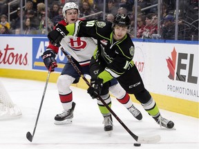 The Edmonton Oil Kings' Vladimir Alistrov (10) battles the Lethbridge Hurricanes during first period WHL action at Rogers Place, in Edmonton Sunday Oct. 28, 2018.