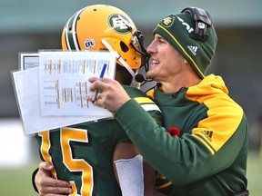 Edmonton Eskimos head coach Jason Maas gives Vidal Hazelton (15) a hug after defeating the Winnipeg Blue Bombers 33-24 during CFL action in the last game of the season at Commonwealth Stadium in Edmonton, November 3, 2018. Ed Kaiser/Postmedia