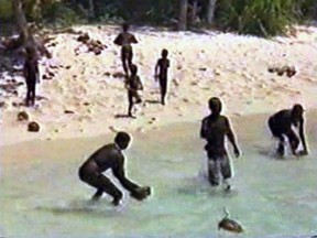 This is an undated photo of members of the Sentinelese tribe from the Andaman Islands in India.
