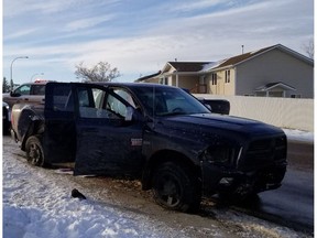 RCMP say this truck was disabled with a spike belt after a chase through Lac La Biche on Thursday, Nov. 22, 2018. The suspect in the case was arrested while hiding in a ceiling at Portage College.