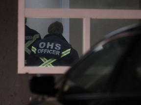 Occupational Health and Safety officers at the headquarters of Millennium Cryogenic Technologies in Leduc. Three men died at the business Thursday, November 2018, in an industrial accident. Photo David Bloom.