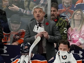 Edmonton Oilers head coach Todd McLellan looks up at the clock during his team's 4-1 loss to the Colorado Avalanche in NHL hockey game action in Edmonton on Sunday November 11, 2018.