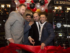 Co-owners of Louisiana Purchase celebrate the opening of their new location on St. Albert Trail. From the left are T.J. Bahniuk, Richard Halabi,Eric Jammaz and Gus Halibi.