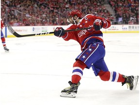 Alex Ovechkin #8 of the Washington Capitals shoots against the Pittsburgh Penguins during the second period at Capital One Arena on December 19, 2018 in Washington, DC.