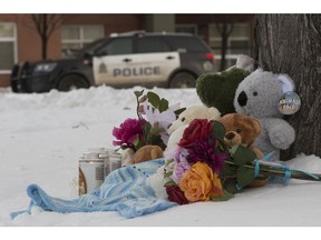 A memorial for two children outside an apartment building at 7920 71 St. in Edmonton on Friday, Dec. 7, 2018.