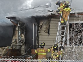 About seven fire crews responded to battle a house fire at 12436 90 St. in Edmonton on Thursday, Dec. 27, 2018.