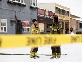 Firefighters continue to work at the scene of a fire at Zar Zor Restaurant, 12118 90 Street, in Edmonton Wednesday Dec. 5, 2018.