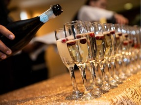 Drinks are poured during the Festival of Trees luncheon gala at the Shaw Conference Centre in Edmonton on Nov. 30, 2018.