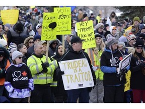 Oil and gas workers and supports attend a rally in solidarity of the industry at Muskoseepi Park on Sunday afternoon. PETER SHOKEIR/POSTMEDIA