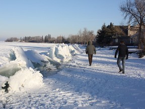 Researchers investigate ice ridges along Lac Ste. Anne after ice quakes caused damage to many houses and properties in several Alberta towns on New Year's Day 2018.