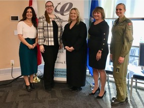 Kendra Kincade, founder and president of Elevate Aviation, left, Alberta Labour Minister Christina Gray, Kirstan Jewell, vice-president of human resources for Edmonton International Airport, Lyne Wilson, assistant vice-president of talent management at Nav Canada, and Maj. Alexia Hannam, commanding officer of 417 Combat Support Helicopter Squadron, at the Edmonton International Airport on Wednesday, Dec. 12, 2018, where a new program was announced to get more women and youth involved in aviation.
