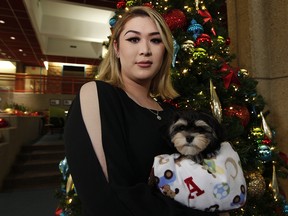 Tiana Sachdeva reunited with her dog Milo that she had reported stolen at Edmonton Police Service headquarters on Monday, Dec. 24, 2018.