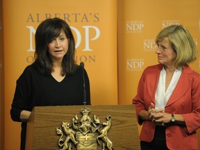 Marie Renaud (left), and Alberta Premier Rachel Notley (right) in a  2014 file photo.