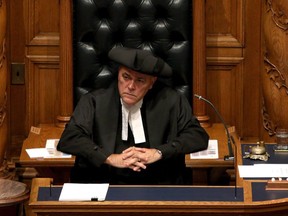 Speaker of the legislature Darryl Plecas looks on as B.C. Finance Minister Carole James delivers the budget from the legislative assembly at Legislature in Victoria, B.C., on Monday, September 11, 2017.