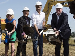 Premier Rachel Notley, left, Enoch Cree Nation Chief Billy Morin,  Natural Resources Minister Amarjeet Sohi and Kinder Morgan president Ian Anderson take part in the groundbreaking ceremony for the Trans Mountain pipeline expansion at the Enoch Cree Stockpile site on July 27, 2018 .