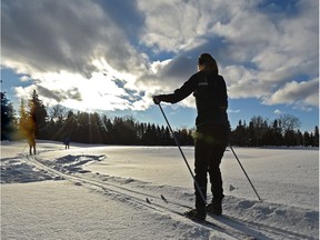 Edmonton resident Marion Wolff (foreground) skis with columnist Elise Stolte and ski racer Greg Nicholson at the Royal Mayfair Golf Course on Dec. 5, 2018.