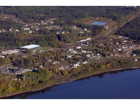 An aerial view of Fort McKay, Alta., Monday, Sept. 19, 2011. An Alberta First Nation is suing the province over development approvals that it says threaten sacred land the government has promised to protect. The Fort McKay First Nation filed the lawsuit in an Edmonton court late last week.