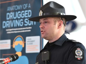 Edmonton policer impaired driving unit Sgt. Robert Davis speaks at Ford's drugged driving and drunk driving suits news conference in Edmonton om Wednesday, Dec. 12, 2018. Using specially designed padding, ankle weights, flashing light goggles and headphones, the drugged driving suit uniquely simulates the slower reaction time, distorted vision, hand tremors and poor co-ordination associated with the use of drugs such as cannabis.
