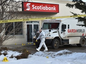 Police investigate an armed robbery of two GardaWorld armoured guards who were injured when a device exploded at a Scotiabank on 160 Avenue near 81 Street around 2 ta.m., Dec. 13, 2018. On Monday, the sentencing hearing began for the man who blew up the homemade bomb.