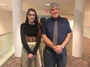 Dalen Cardinal and ETS driver Larry Waters at City Hall on Dec. 11, 2018.