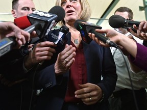 Premier Rachel Notley holds a media availability just before boarding a flight to Montreal for the first minister’s meeting, at the Edmonton International Airport, December 6, 2018. Ed Kaiser/Postmedia