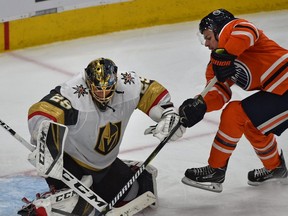 Edmonton Oilers Ty Rattie (8) can't jam the puck past Vegas Golden Knights goalie Marc-Andre Fleury (29) during NHL action at Rogers Place in Edmonton, December 1, 2018. Ed Kaiser/Postmedia