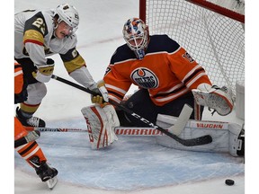 Edmonton Oilers goalie Mikko Koskinen (19) makes a save on Vegas Golden Knights Daniel Carr (23) during NHL action at Rogers Place in Edmonton, December 1, 2018. Ed Kaiser/Postmedia