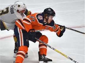 Edmonton Oilers Connor McDavid (97) gets ahead of Vegas Golden Knights Brayden McNabb (3) on a rush to the net during NHL action at Rogers Place in Edmonton, December 1, 2018.