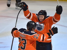Edmonton Oilers Ryan Spooner (23) celebrates with Ty Rattie (8) after what turned out to new the winning goal against the Vegas Golden Knights during NHL action at Rogers Place in Edmonton, December 1, 2018. Ed Kaiser/Postmedia