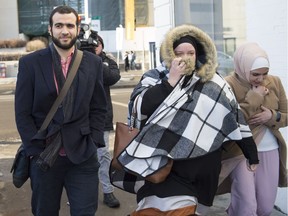 Omar Khadr leaves the courthouse in Edmonton on Friday, Dec. 21, 2018, after a judge denied his request for changes in bail conditions.