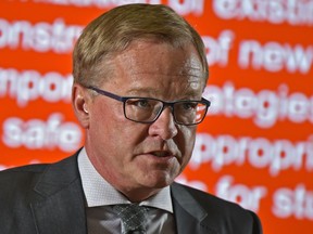 Minister of Education, David Eggen speaking to reporters Wednesday, Jan. 9, 2019, at Ross Sheppard High School in Edmonton.