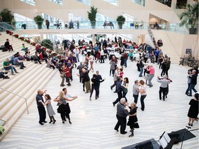 People dance during the first Swingin' City Sunday of the year at City Hall on Sunday, Jan. 6.