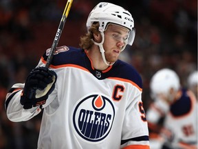 Edmonton Oilers captain Connor McDavid received a two-game suspension for a hit to the head on New York Islanders defenceman Nick Leddy Thursday.