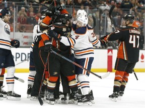ANAHEIM, CALIFORNIA - JANUARY 06: The Anaheim Ducks and the Edmonton Oilers fight during the first period at Honda Center on January 06, 2019 in Anaheim, California.