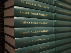 Catholic Books of Worship are visible inside a Catholic School Board meeting in Edmonton. File photo.