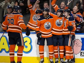The Edmonton Oilers' Leon Draisaitl (29), Darnell Nurse (25), Connor McDavid (97) and Ryan Nugent-Hopkins (93) celebrate McDavid's game tying goal against the Florida Panthers during third period NHL action at Rogers Place, in Edmonton Thursday Jan. 10, 2019. Photo by David Bloom