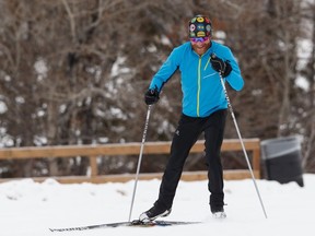 A cross country skier climbs a hill in Capilano Park in the Gold Bar neighbourhood in Edmonton, on Thursday, Jan. 24, 2019.