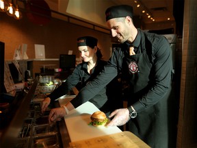 Xeniya Danilov, left, and husband Ivan Danilov, franchise owners at Copper Branch at Suncor Energy Centre in Calgary, on Thursday January 24, 2019. Copper Branch is a vegan restaurant that just opened in the city. Leah Hennel/Postmedia