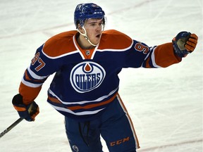 Edmonton Oilers Connor McDavid (97) gestures to the referee after getting a penalty playing against Ottawa Senators during NHL action at Rexall Place in Edmonton, February 23, 2016.