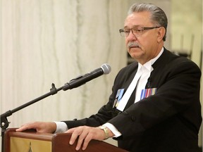 Speaker of the Alberta Legislative Assembly Gene Zwozdesky hosts the Black Ribbon Day ceremony in remembrance of those affected by the Molotov-Ribbentrop pact of 1939, at the Alberta Legislature in Edmonton Alta., on Saturday Aug. 23, 2014.