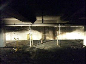 The blackened area in the lower level (P2) of the Strathcona County Community Centre parkade, where the inital explosion took place on Nov. 6. The teleposts were put in place as an added precaution while heavy machinery was in the parkade removing vehicles.