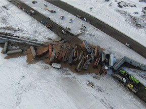 Firefighters from Saskatoon, Warman and Dalmeny responded to a large CN Rail freigh train derailment on Highway 11 on the outskirts of Saskatoon on Tuesday morning, Jan. 22, 2019. There were no injuries reported after the derailment of the train, which was carrying grain. (Photo courtesy Saskatoon Police Service)