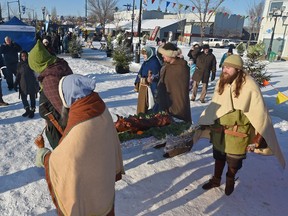 The Vikings carrying the roast pig at the 8th annual Deep Freeze Byzantine Winter Festival: Return of the Vikings! along 118 Ave. and 92 St. in Edmonton, January 11, 2015. File photo.
