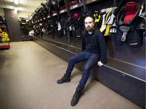 Grant MacEwan Griffins hockey coach Mike Ringrose sits in the team's dressing room on Tuesday, Jan. 29, 2019, after talking about the death of teammate Nakehko Lamothe, who collapsed and died following a game in Calgary on Friday, Jan. 25, 2019.